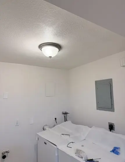 Flush-mount ceiling light in a laundry room
